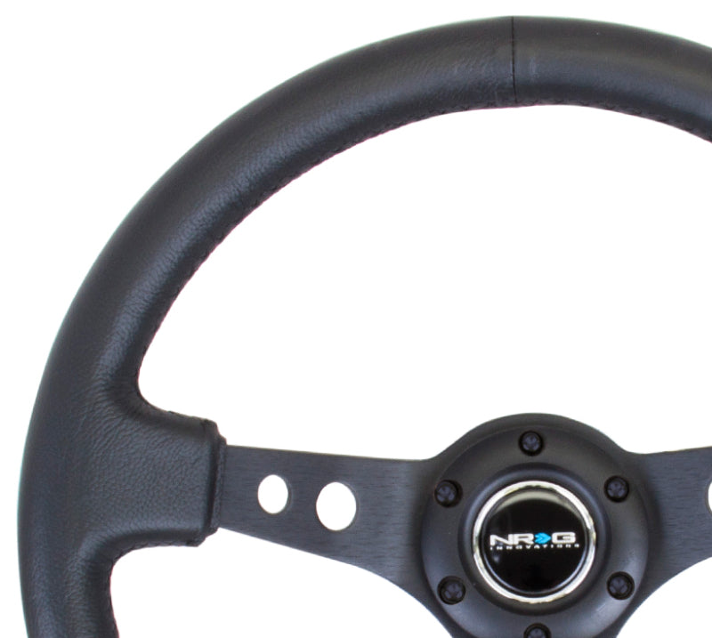 NRG Reinforced Steering Wheel (350mm / 3in. Deep) Blk Leather w/Blk Spoke & Circle Cutouts - awdtuningtx